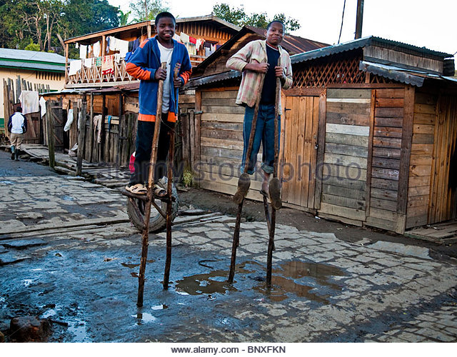 two-boys-in-andisabe-village-eastern-madagascar-proudly-showing-off-bnxfkn